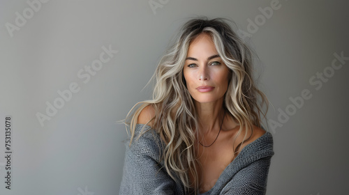 
beautiful 50s middle-aged mature woman isolated on a white background. skin care beauty, skincare cosmetics concept.
