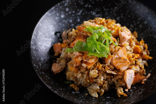 Japanese fried rice yakimeshi isolated in black background