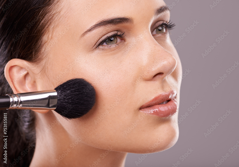 Woman, beauty and brush with makeup, thinking and studio for glamour, radiance and lip gloss. Female person, blush brush and foundation in grey background, vision and attractive confidence cosmetics Woman, beauty and brush with makeup, thinking and studio for glamour, radiance and lip gloss. Female person, blush brush and foundation in grey background, vision and attractive confidence cosmetics