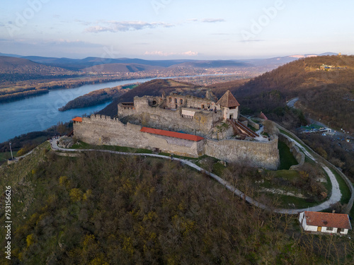 Fototapeta Naklejka Na Ścianę i Meble -  Aerial photos of the Visegrad Castle in Hungary on a sunny winter day.
Drone Photo, Visegrádi Fellegvár, Visegrad Castle, Duna, Danube, Sunny Winter Day