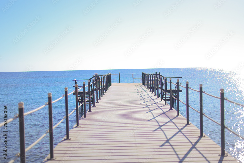 sea pier in Egypt. wooden pier. summer time.