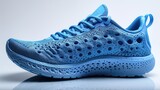 Close-up of blue sports sneakers on a white background.