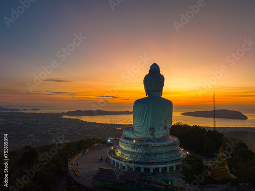 Amazing sweet sky in sunrise at Phuket big Buddha. .The beauty of the statue fits perfectly with the charming nature..amazing pink sky in sweety sunrise at Phuket big Buddha.
