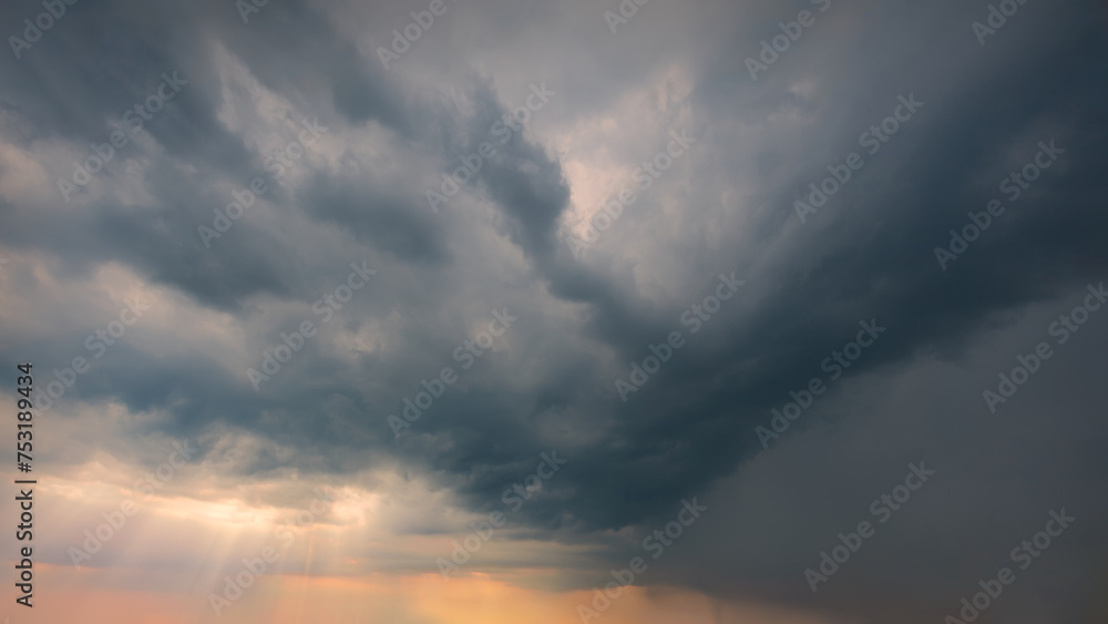 Stormy sunset sky with clouds as beautiful natural background
