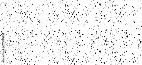 Grunge gritty overlay background. Noise texture with grains, tiny speckles, and flecks. Distressed splattered paper
