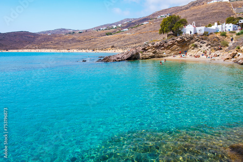 Paralia Agios Sostis wild and free beach in the north of Mykonos  Greece. Pristine bay with blue sea and crystal water  famous for naturism and Kiki s Tavern  peaceful and quiet.