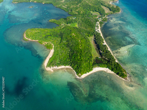 Top view of Cabangajan Island with white sandy beach. Santa Fe, Tablas, Romblon. Philippines.
