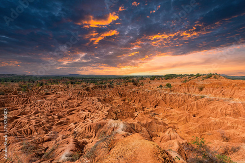 Beautiful landscape with colorful sunset in red desert. Tatacoa Desert, Huila, Colombia. photo