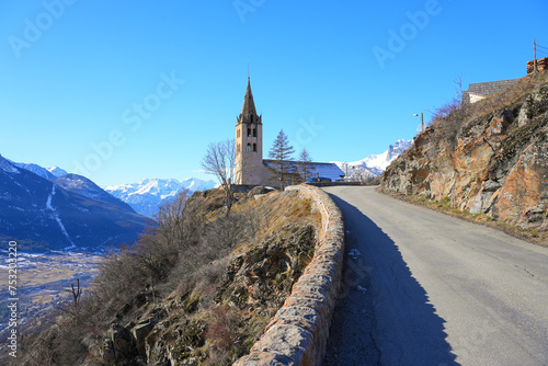 Church of Saint Peter in Puy-Saint-Pierre, a hillside Alpine village located above Briançon in the Hautes Alpes department of the French Alps, France photo