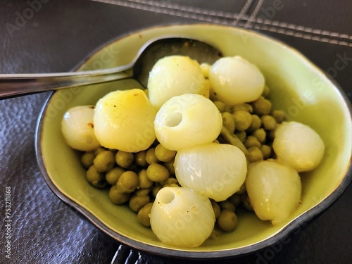 Pickled Onions and Green Peas in Bowl  High Angle View
