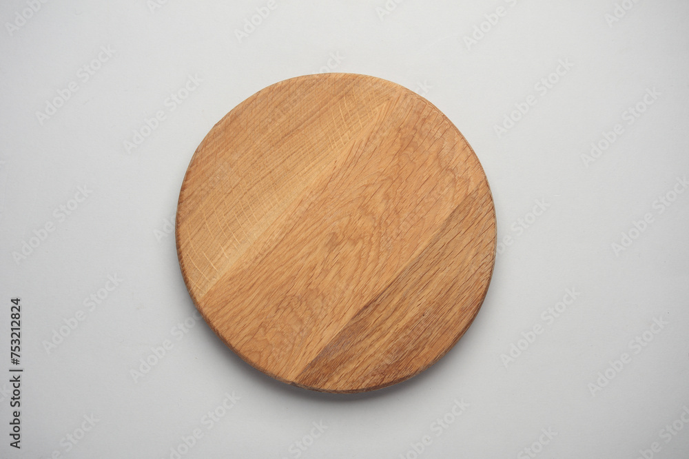 Wooden circle for your design or showcase on a gray background Wooden circle for your design or showcase on a gray background