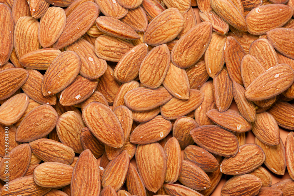 Fototapeta premium Almond Extravaganza: An Exquisite Close-up Shot of Raw Nuts