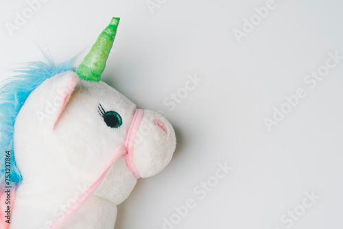 Picture of unicorn doll on white background, It is a high-growth  business idea worth over $1 billion. Start up unicorn. photo
