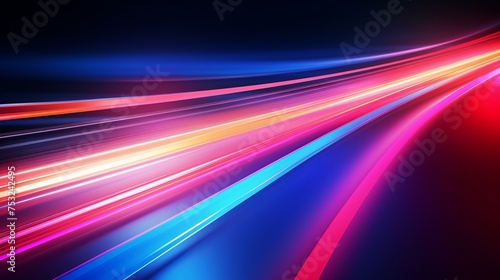 Vibrant neon hues streak across a speedway, creating blurred motion.