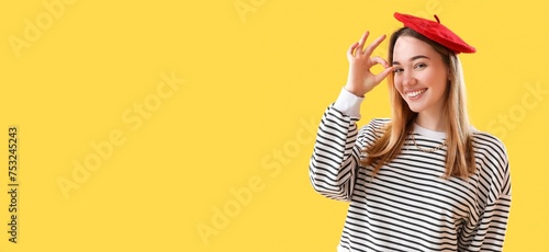 French young woman showing ...