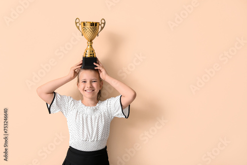 Cute little schoolgirl with...