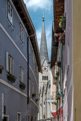 Church amd houses in historic village Hallstatt in Austrian Alps.