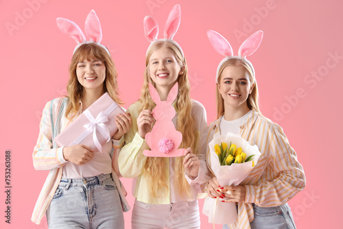 Young girls with bunny ears...