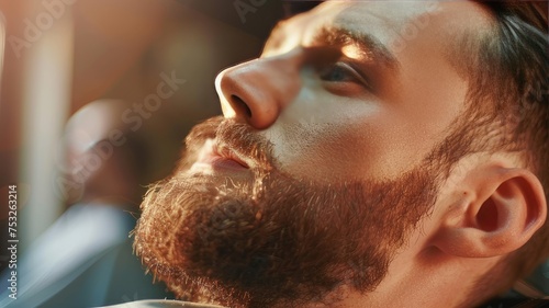 Barber Examining Client's Profile in Professional Grooming Session: Close-up Profile View photo