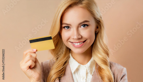 Smiling woman holds her credit card 