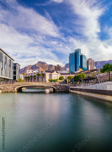 V and A Waterfront canal and Cape Town city with the table mountain in the background, Cape Town, South Africa