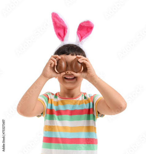 Smiling child wearing bunny...