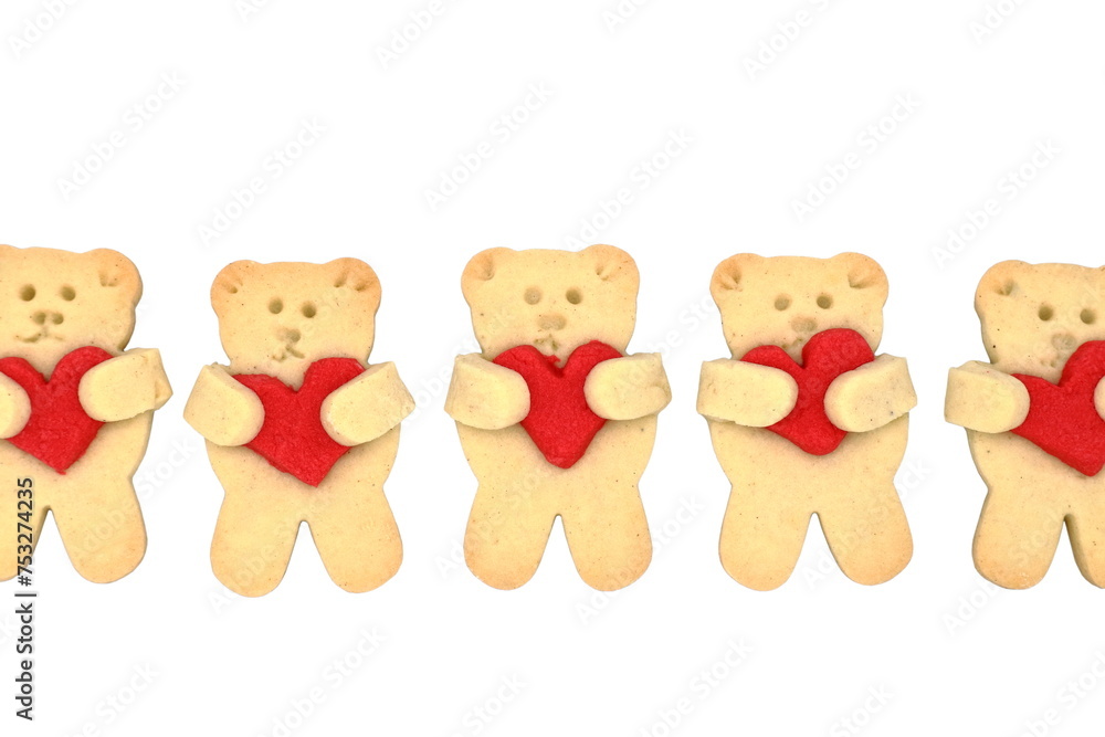 Cute cookie bears with red heart isolated on white. Valentine's day celebration Cute cookie bears with red heart isolated on white. Valentine's day celebration