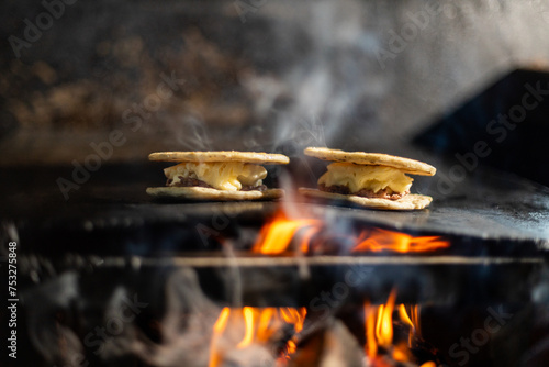 Making flour tortillas for the Honduran tortillas with melted cheese