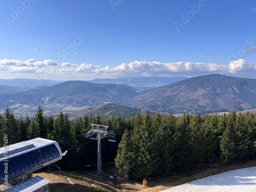 Kouty nad Desnou, Czech, Silesia, 5 March 2024: lookout tower at named ,,Tetřeví cottage'' , beautiful scenery and panorama of the Czech mountains in Jeseníky photo