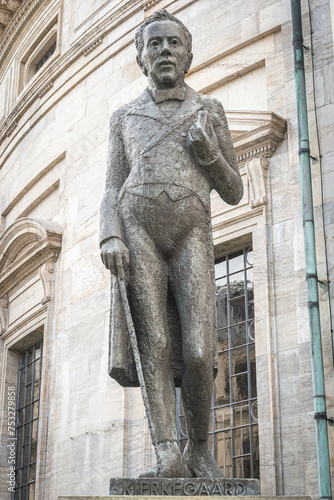 Statue of Danish philosopher Soren Kierkegaard outside Frederik V Church in Copenhagen, Denmark photo