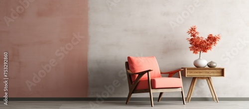 Modern mid century minimalist living room interior with vintage coral armchair and wooden table on concrete floor