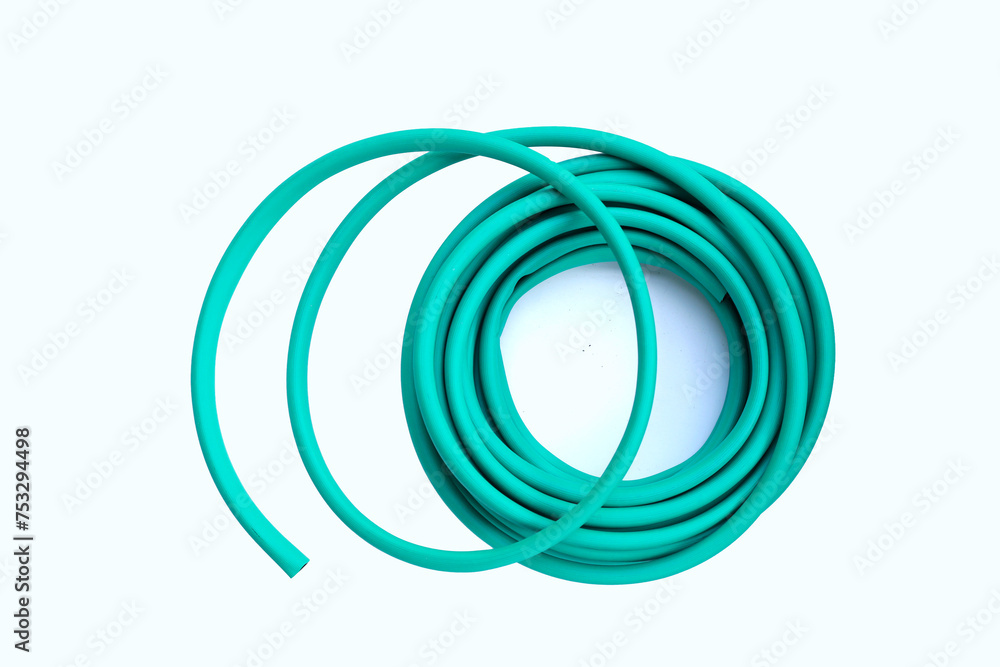 Green garden hose on white background. Green garden hose on white background.