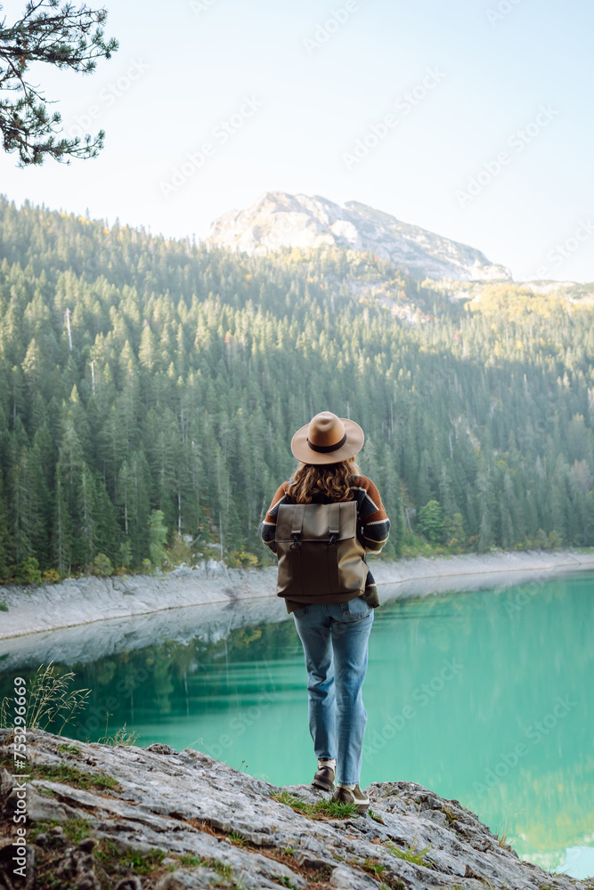 Young woman enjoy mountains and lake. Lifestyle, adventure, nature, active life. Young woman enjoy mountains and lake. Lifestyle, adventure, nature, active life.