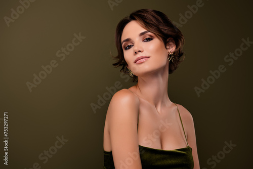 Photo of stunning girl bachelorette wear expensive jewelry velvet cocktail gown isolated green background
