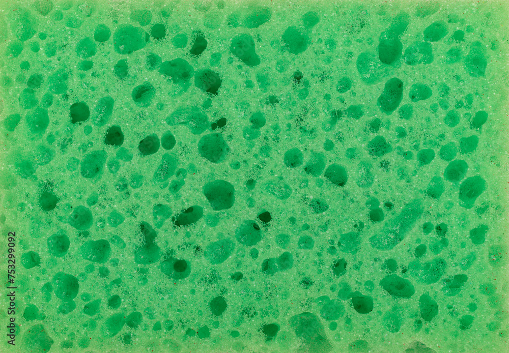 Close-up of a dishwashing sponge. Sponge texture. Close-up of a dishwashing sponge. Sponge texture.