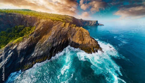 Aerial view of sea waves and fantastic Rocky coast. Summer seascape from drone. Travel concept © adobedesigner