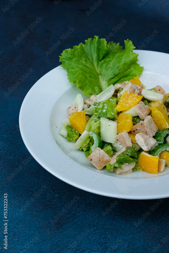Asian Chicken Salad served on a white plate, social media post, food photography, fine dining, blue background, restaurant menu, Healthy, lifestyle, diet, vegan Asian Chicken Salad served on a white plate, social media post, food photography, fine dining, blue background, restaurant menu, Healthy, lifestyle, diet, vegan