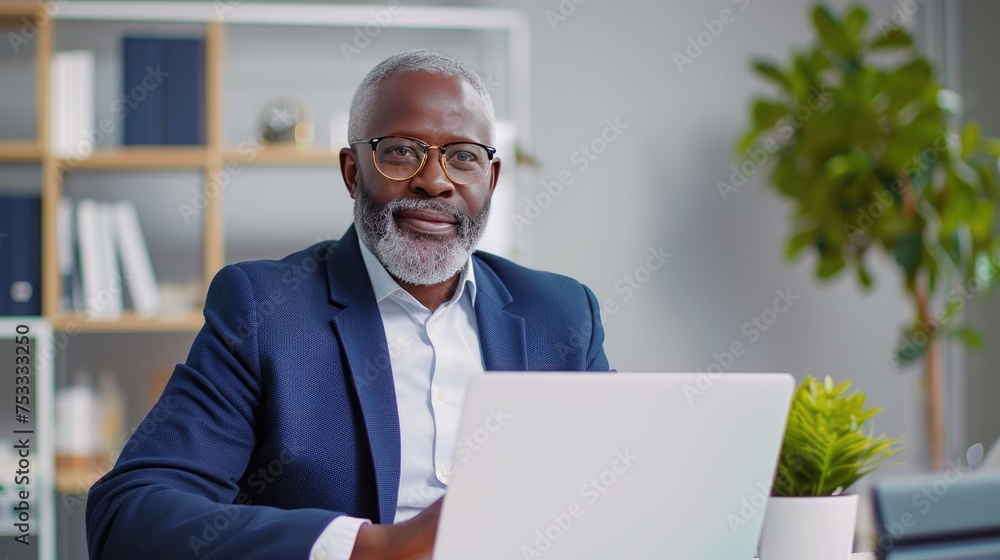 Man works on a laptop Man works on a laptop