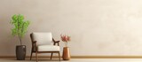 Minimalist interior design with armchair against empty cream wall
