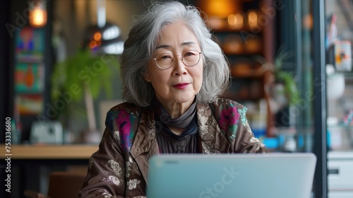 Woman works on a laptop 