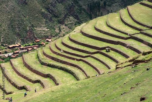 The Pisac Ruins are an archaeological site located in the Sacred Valley of Peru,. These ruins are part of the larger Inca Empire and are known for their impressive agricultural terraces. photo