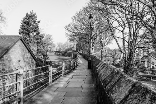 Chester City Walls, ancient defensive walls surrunding the old town of Chesteer, Cheshire, England, UK in black and white