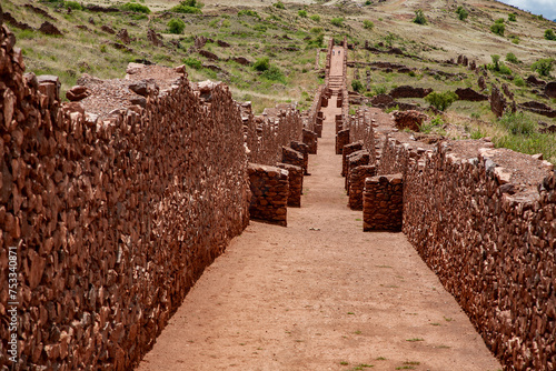 
Pikillacta is an ancient archaeological site located in the highlands of Peru, near the city of Cusco. It is believed to have been constructed by the Wari civilization, a pre-Inca culture. photo