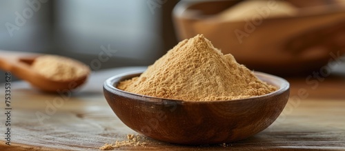 Yeast Extract Powder, a byproduct of brewing with concentrated yeast, widely utilized in the food industry as an additive. photo