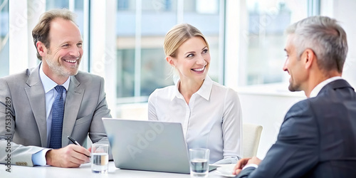 Image of businessmen sitting in a meeting in the office.