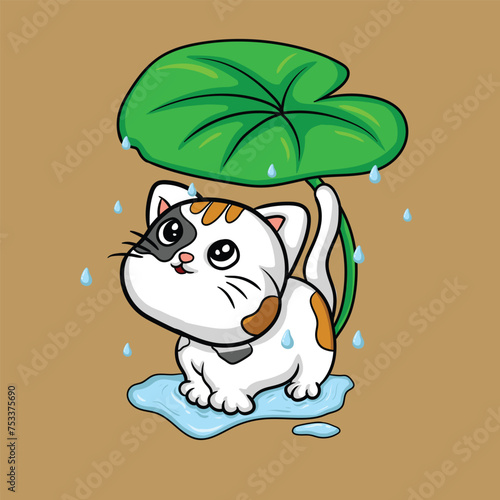 cute cat taking shelter under a leaf