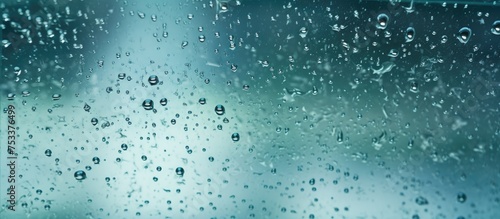 Glass texture background with water droplets in a shower room photo