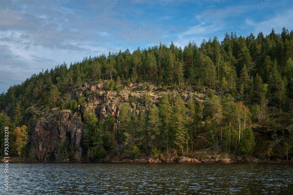 Naklejka premium Lake Ladoga near the village Lumivaara on a sunny autumn day, Ladoga skerries, Lakhdenpokhya, Republic of Karelia, Russia