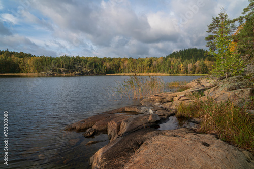 View from the shore of Lake Ladoga near the village of Lumivaara on a sunny autumn day, Ladoga skerries, Lahdenpohya, Republic of Karelia, Russia photo