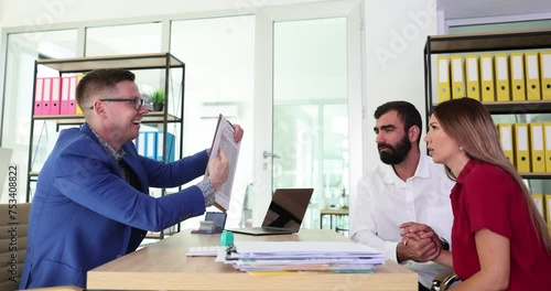 Man refuses to approve document of couple and kicks out of office photo